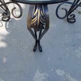 Wrought iron and glass round table