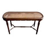 Piano bench in dark wood and cane