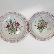 Lunéville, two floral earthenware bowls with pierced edges from the early 20th century.