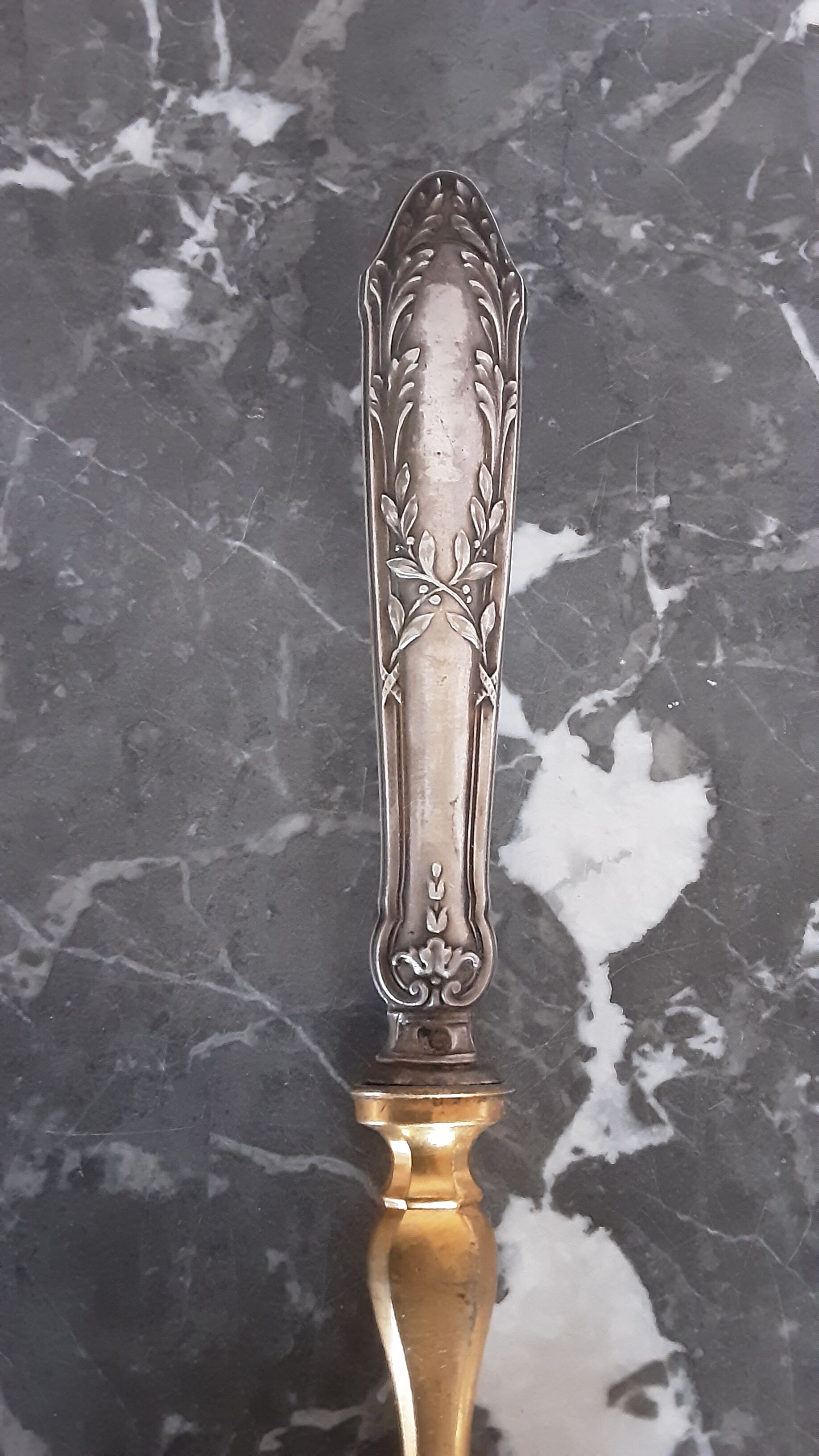 Old brass and silver pie shovel
