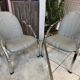 Pair of Souvignet armchairs, grey leather, chrome, 1980.