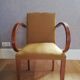 Bridge armchair with mustache back