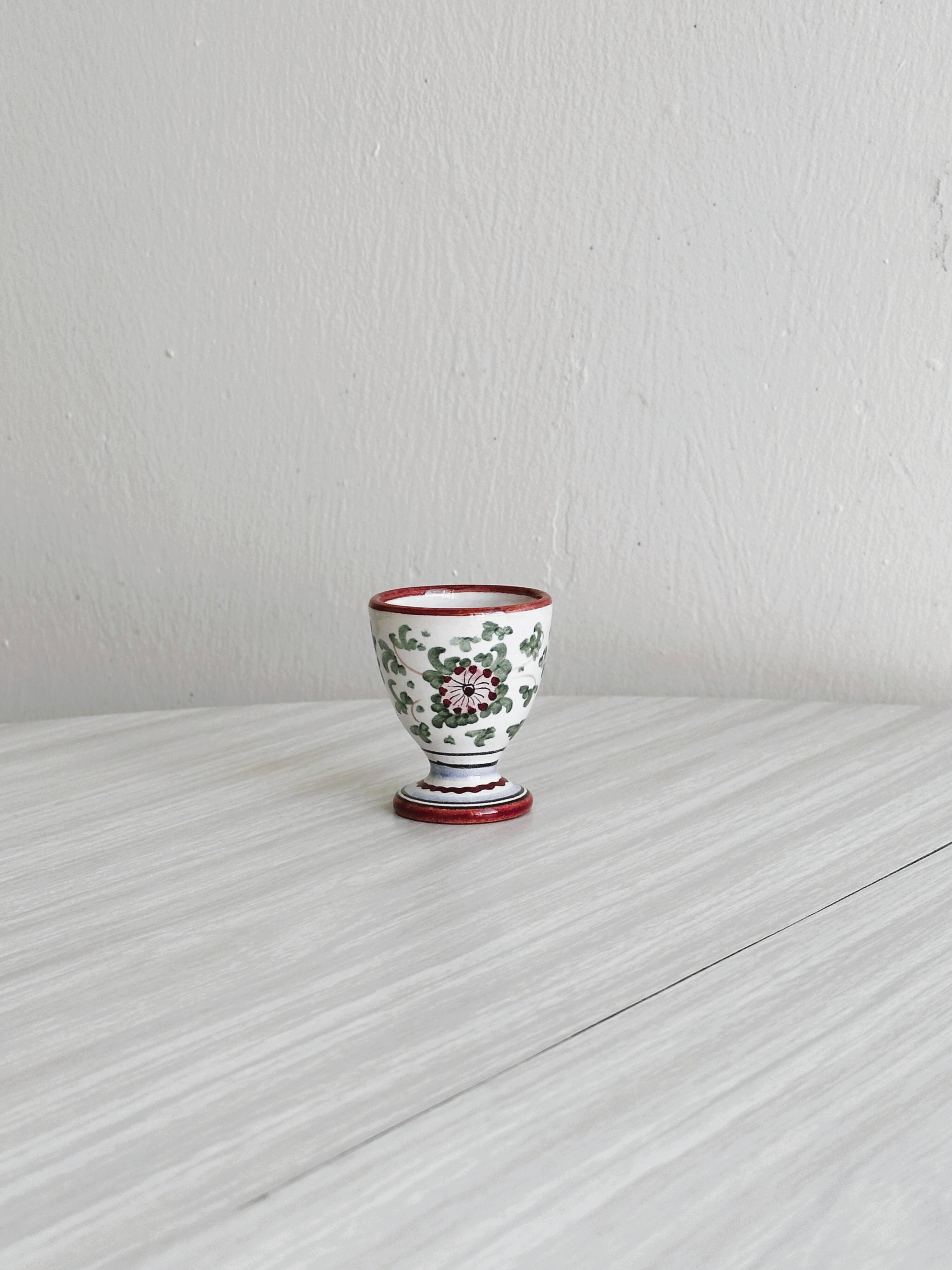 small vintage hand-painted ceramic egg cup