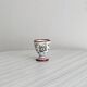 small vintage hand-painted ceramic egg cup