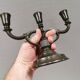 Three-armed candlesticks by Just Andersen, in Disco metal, Denmark, 1950s