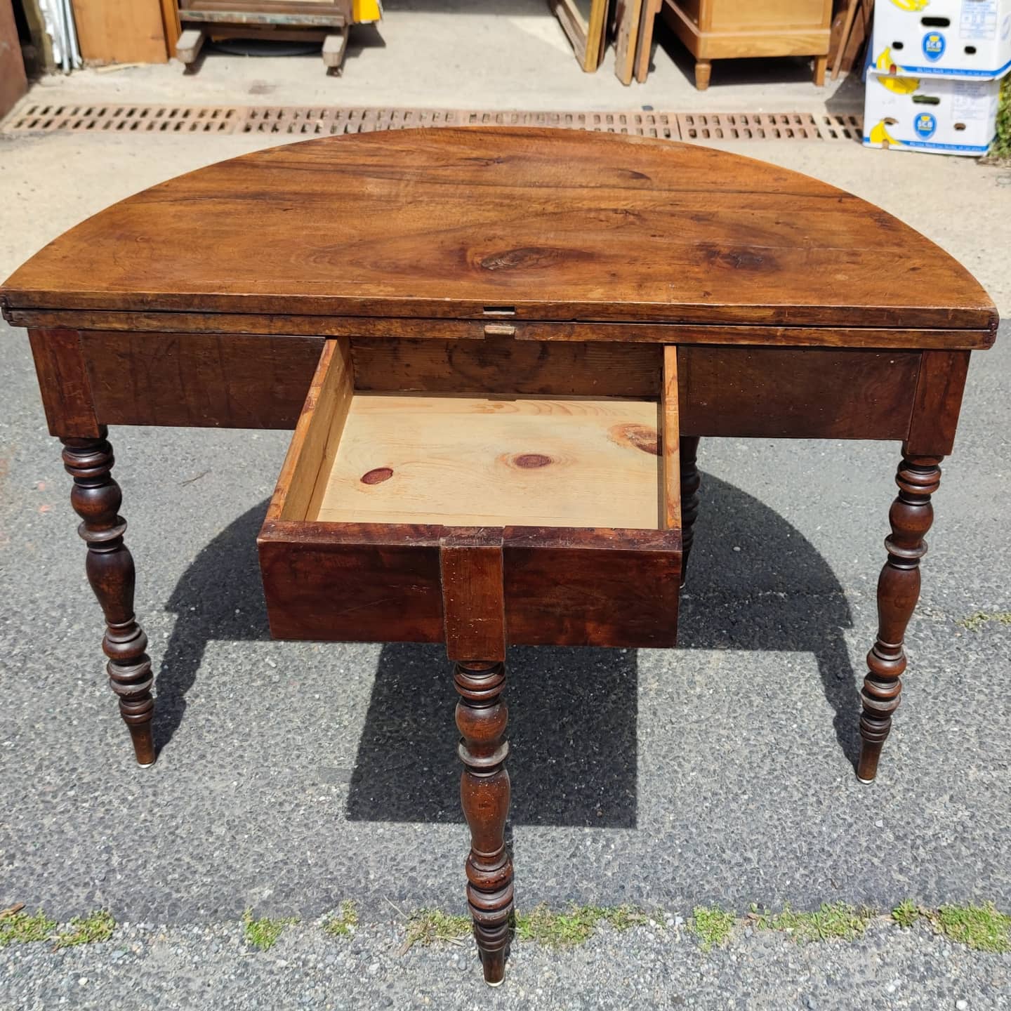 Half-moon console table in solid walnut