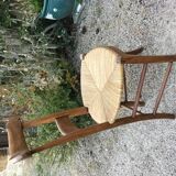 Solid oak table with 3 extension cords, 6 oak chairs with straw seat