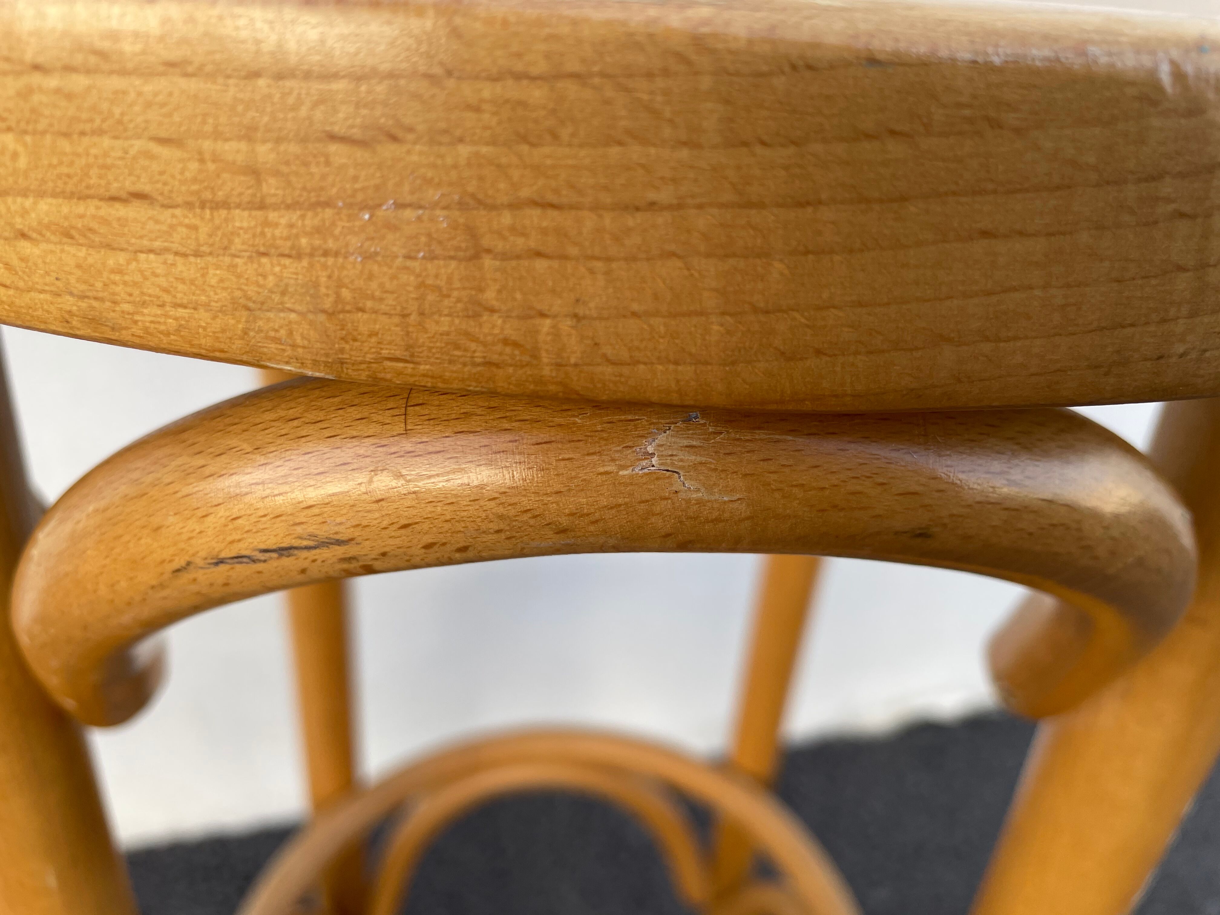 Curved wooden bar stool