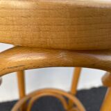 Curved wooden bar stool