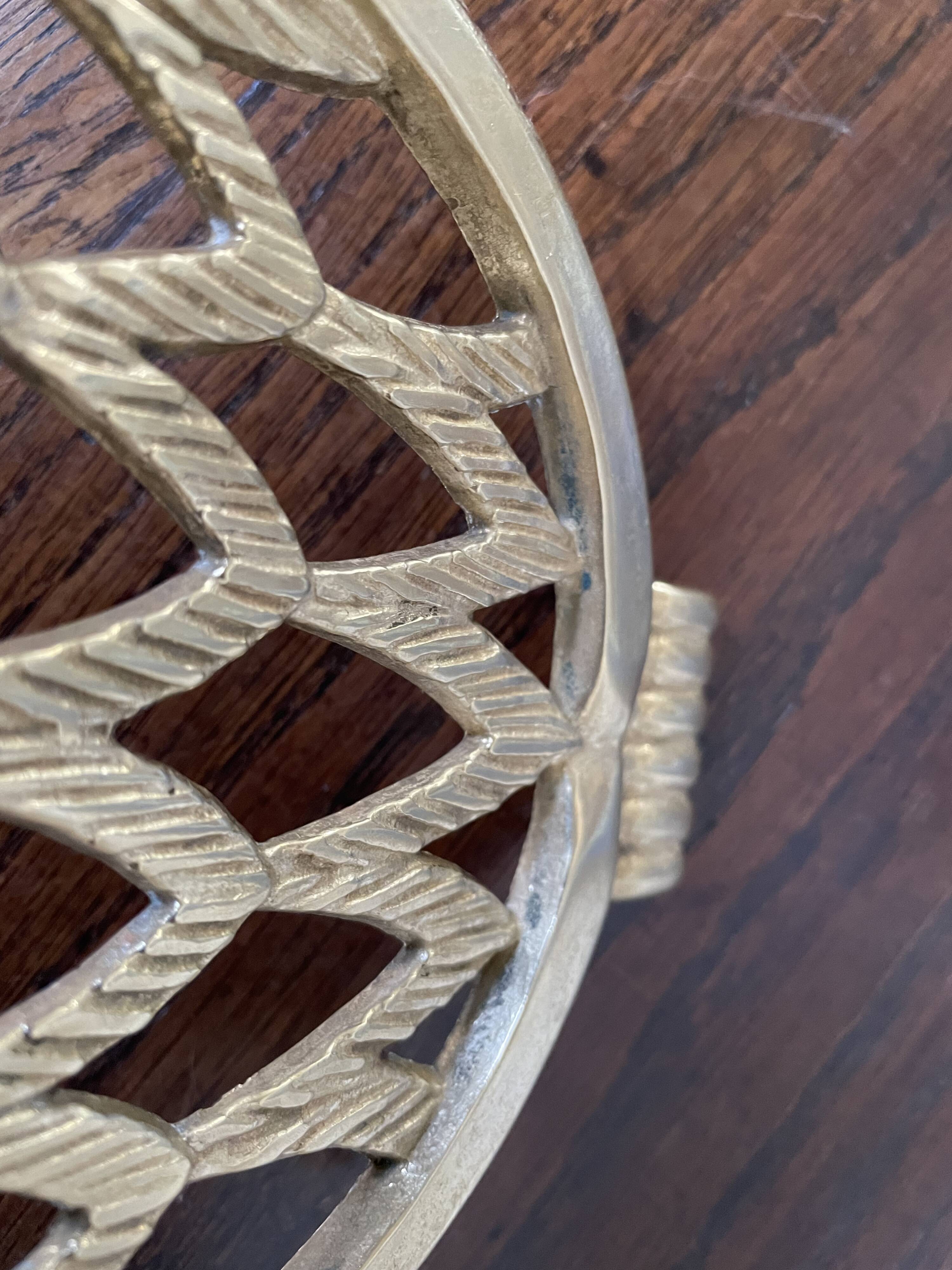 Owl trivet in golden brass