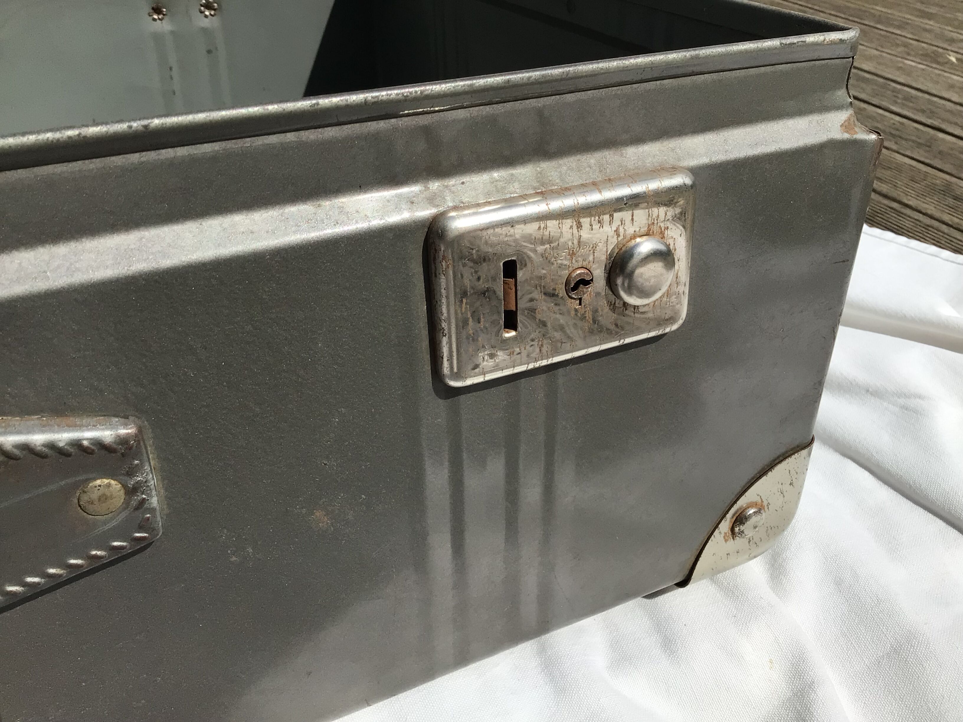 Vintage dark grey metal suitcase