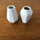8 vases miniatures en faïence blanche