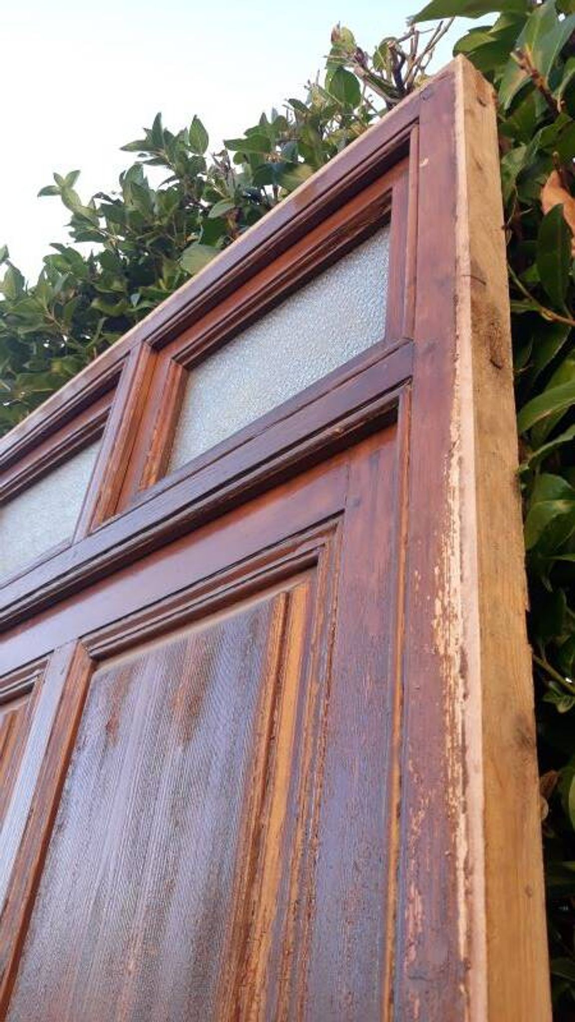 Porte d'entrée et son cadre imposte en verre translucide, début XXème