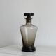 Smoked glass bottle, sculpted stopper
