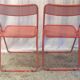 Orange metal folding chairs (set of 2) - 70s/80s