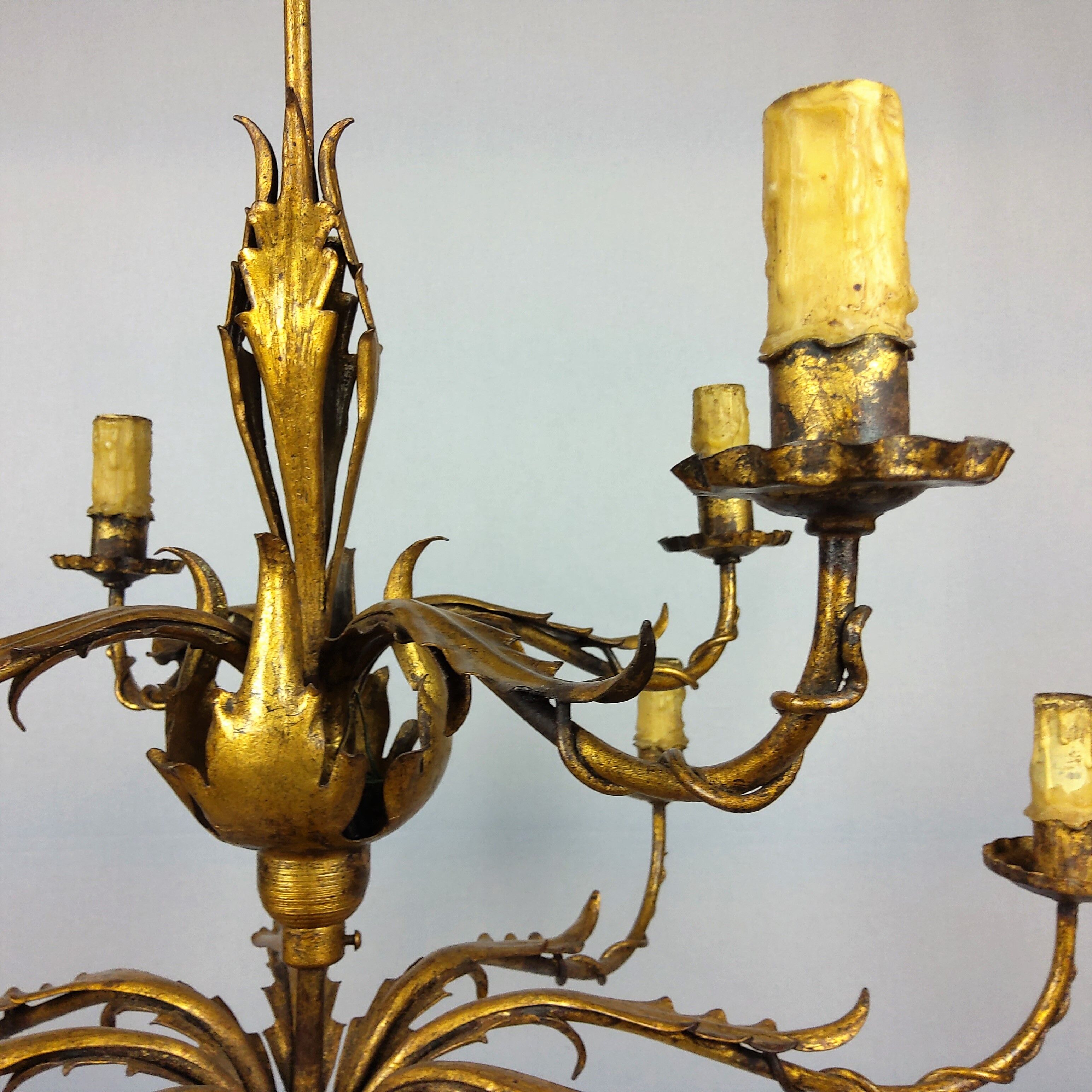 Golden luster with 12 arms of light decorated with leaves 1940