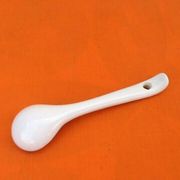 White porcelain gravy boat, fruit basket decor