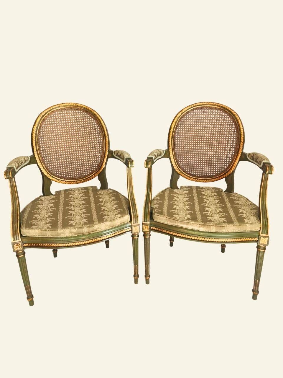 Pair of Louis XVI style armchairs, oval backrest and caning.