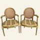 Pair of Louis XVI style armchairs, oval backrest and caning.