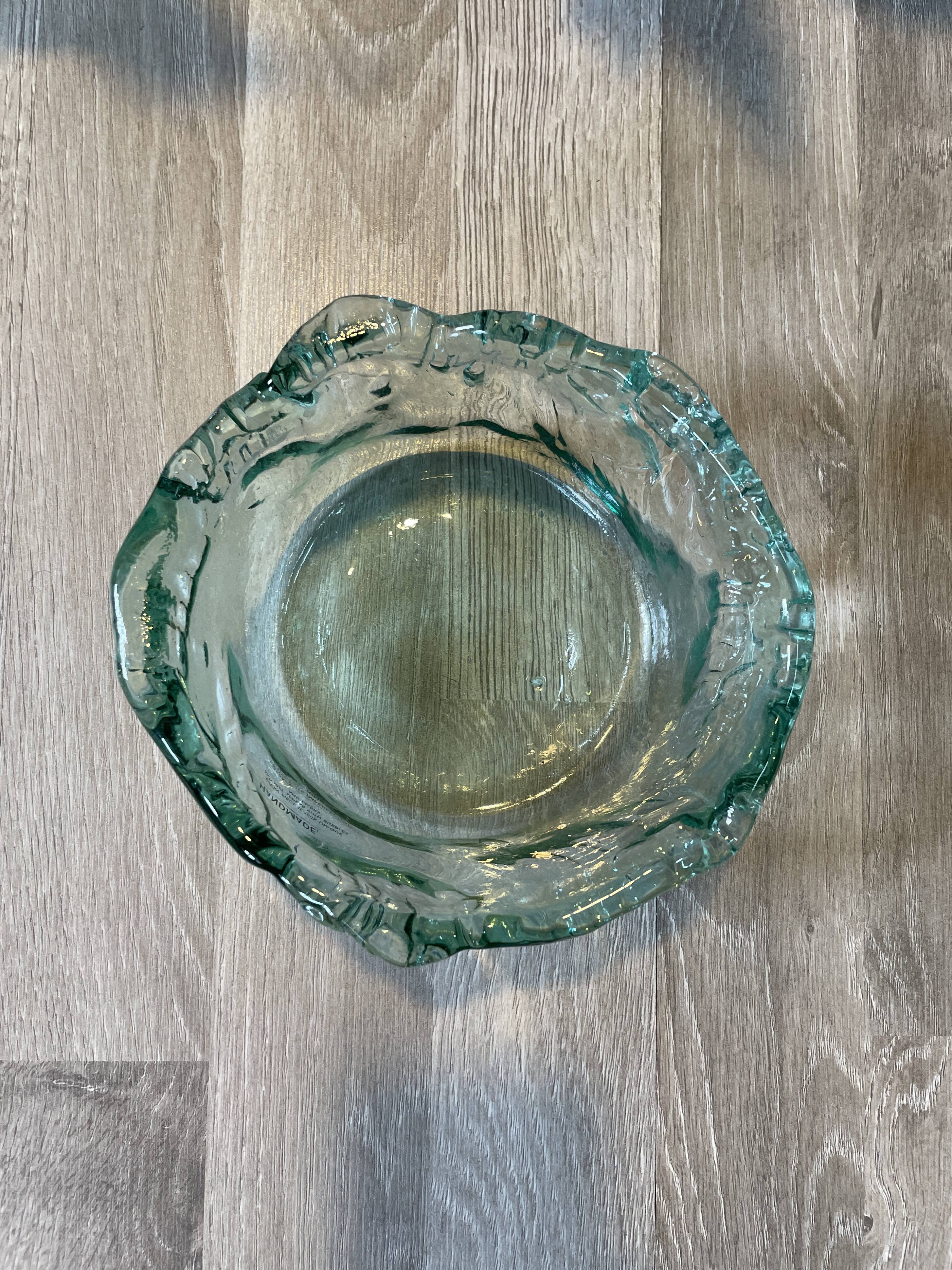 Small, free-form, organic glass jar