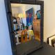 Patinated black rectangular wooden mirror