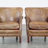 Set of 2 nice, subtle cowhide armchairs with reversible Kelim seat cushions