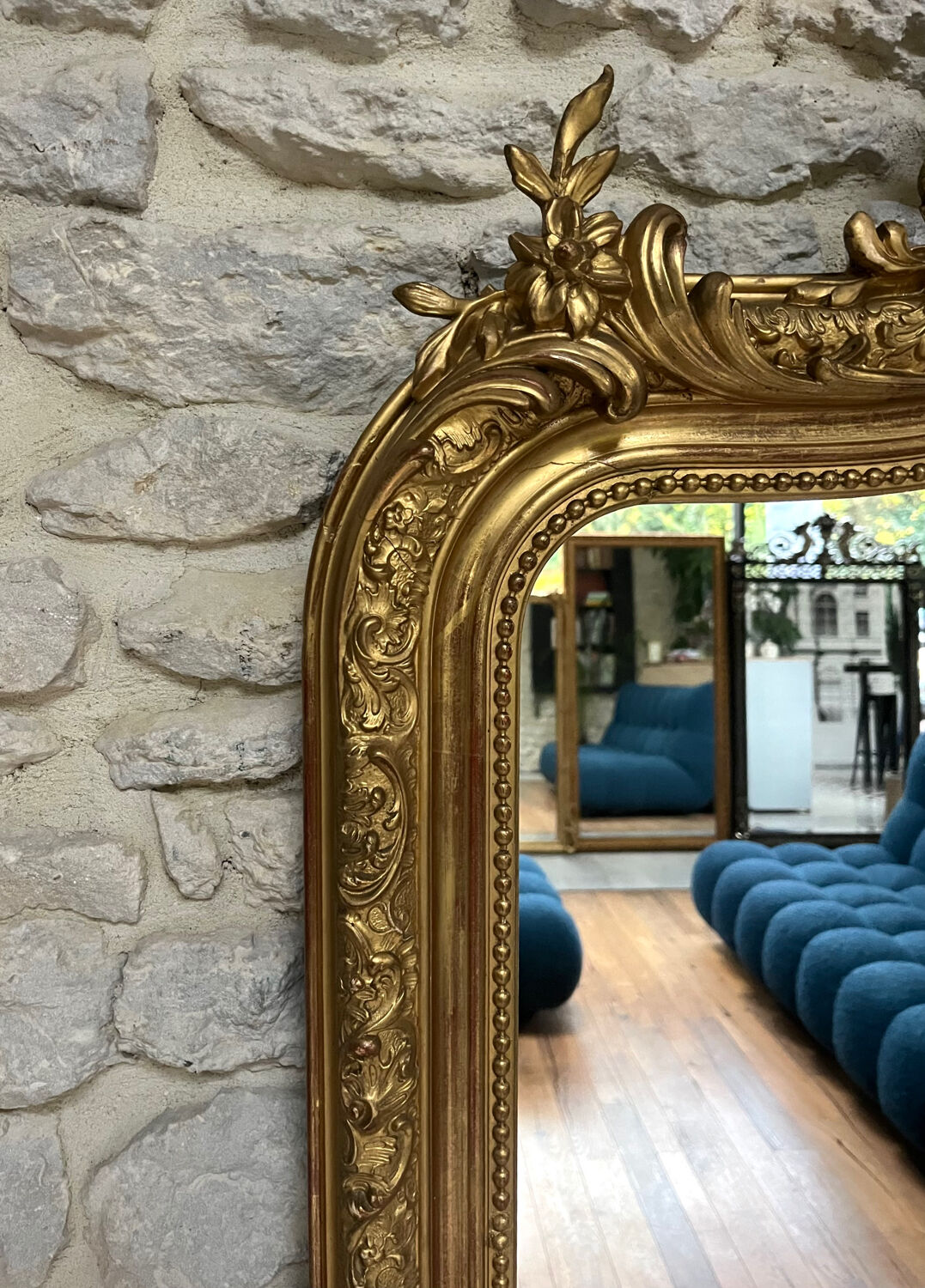 Antique mirror 183.5/116cm with pediments and pearl detailing in gold leaf.