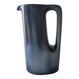 Sleek shaped pitcher in blue shaded ceramic. Signed under the base Stocker Fred and Andrée