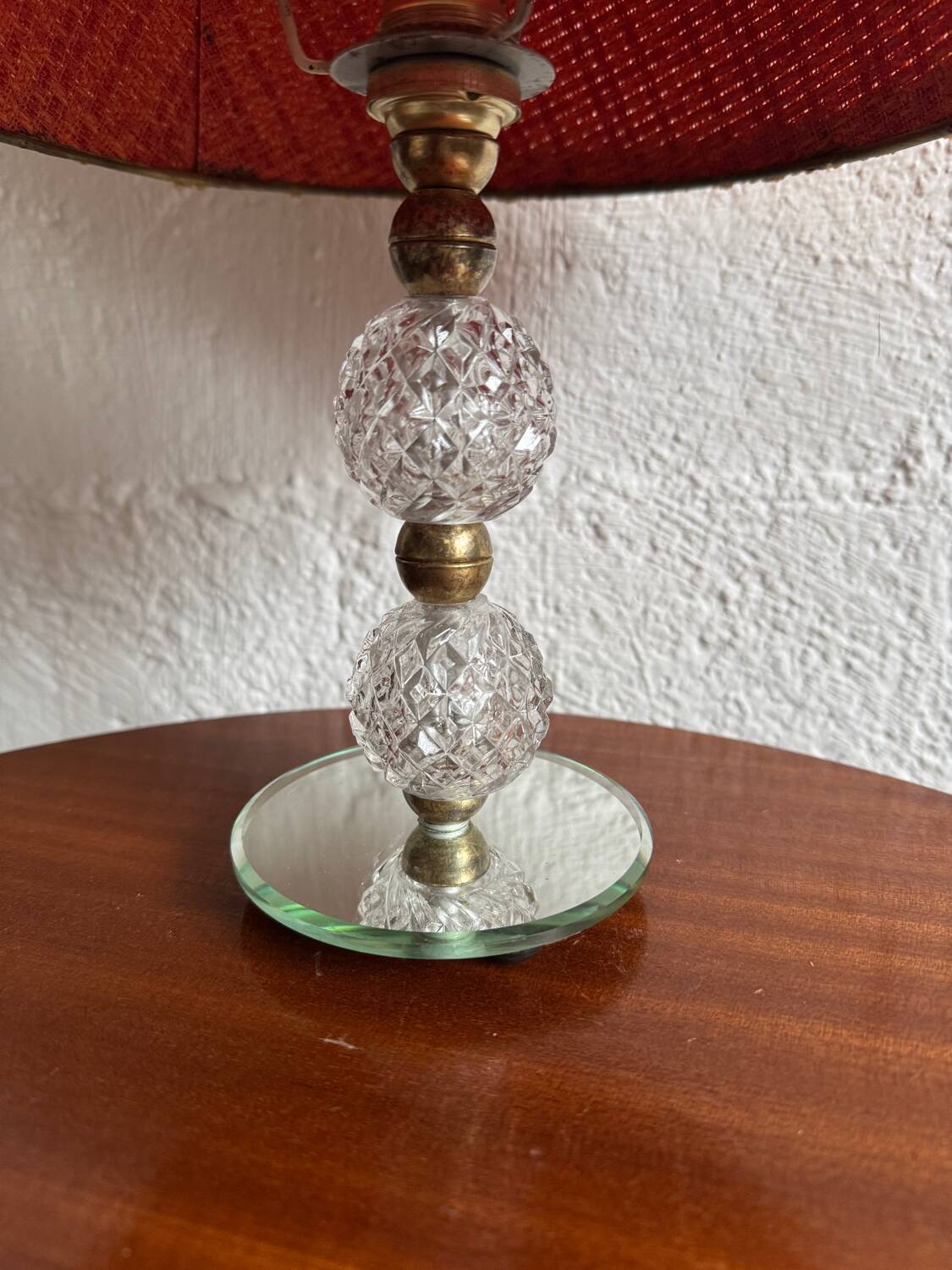 Small glass, mirror, and brass lamp from the 1960s.