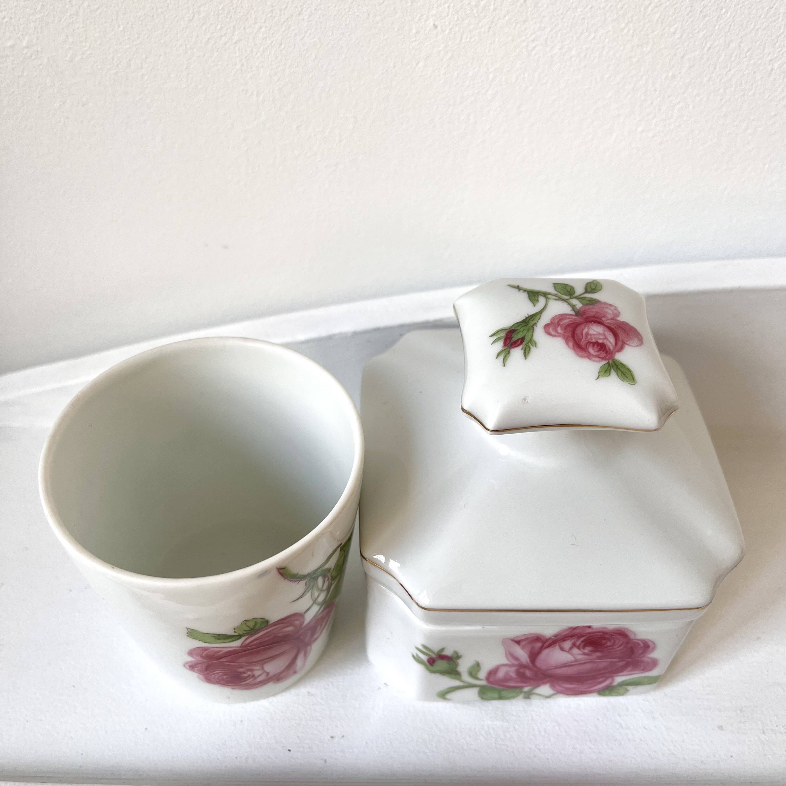 Limoges porcelain toiletry bottles decorated with roses