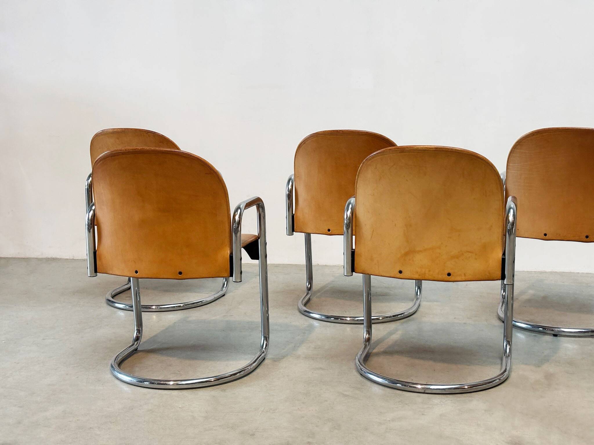 Set of eight cognac leather Dialogo Dessau dining chairs by Afra E Tobia Scarpa