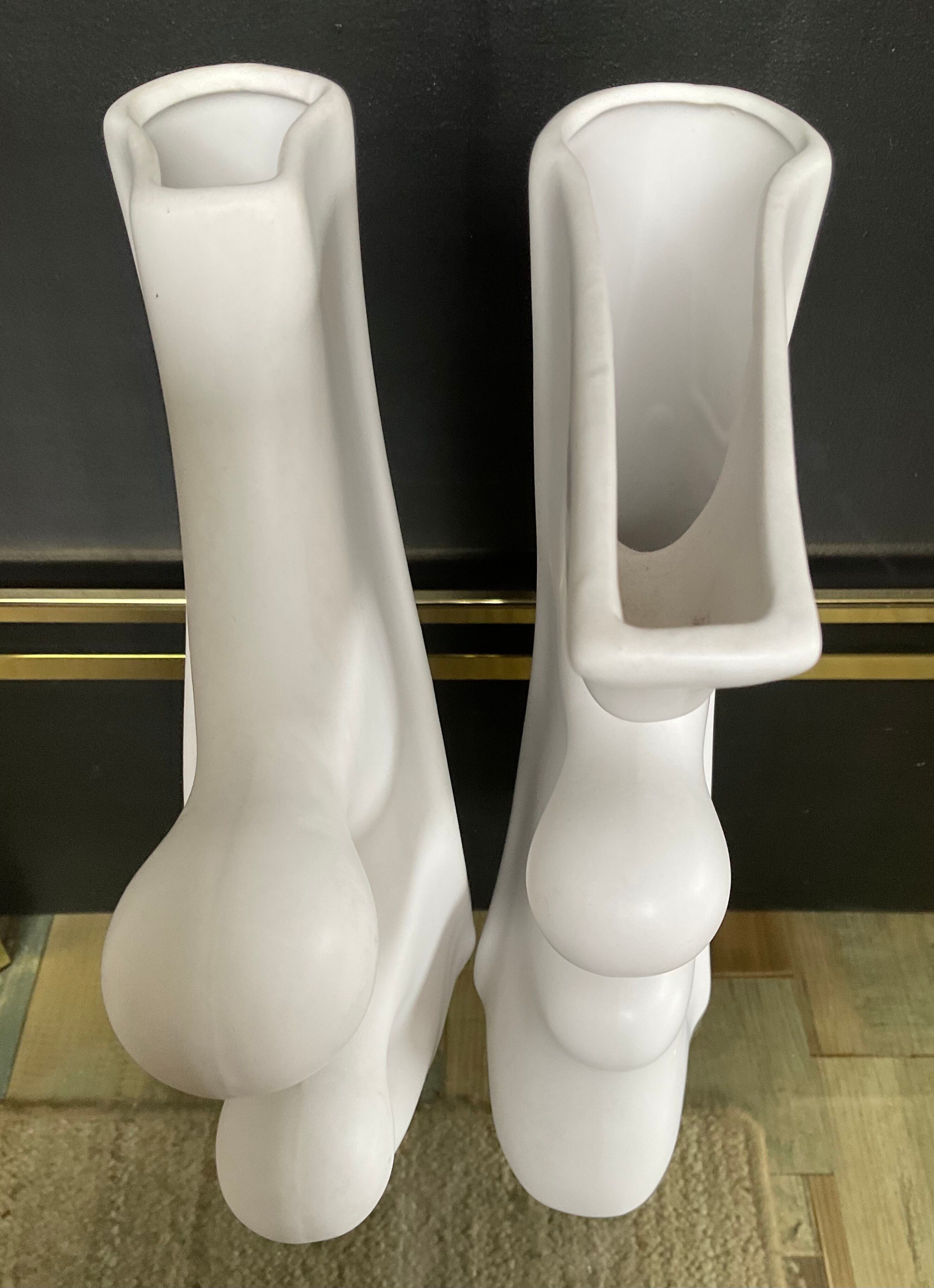 A pair of large designer ceramic vases.