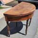 Half-moon console table in solid walnut