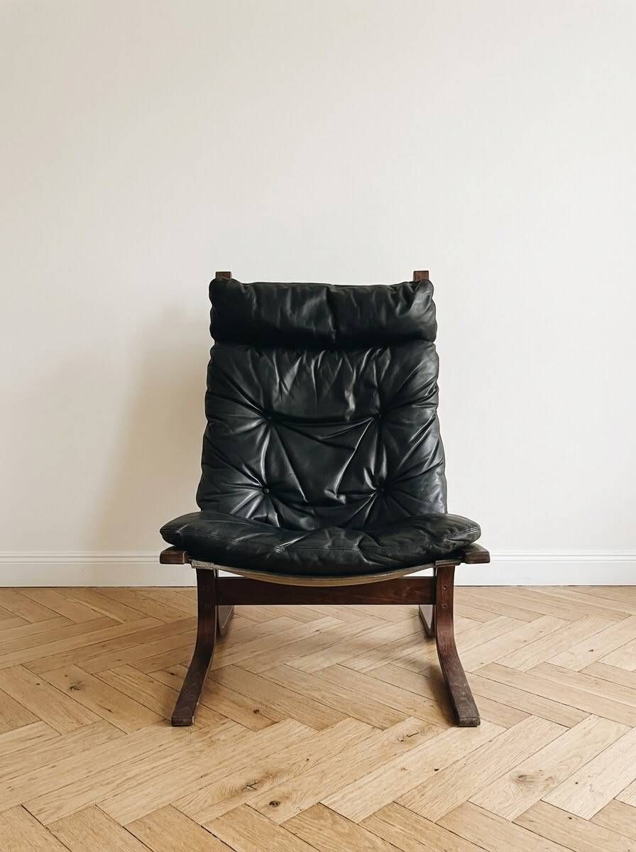 Vintage Siesta armchair by Ingmar Relling for Westnofa in black leather.