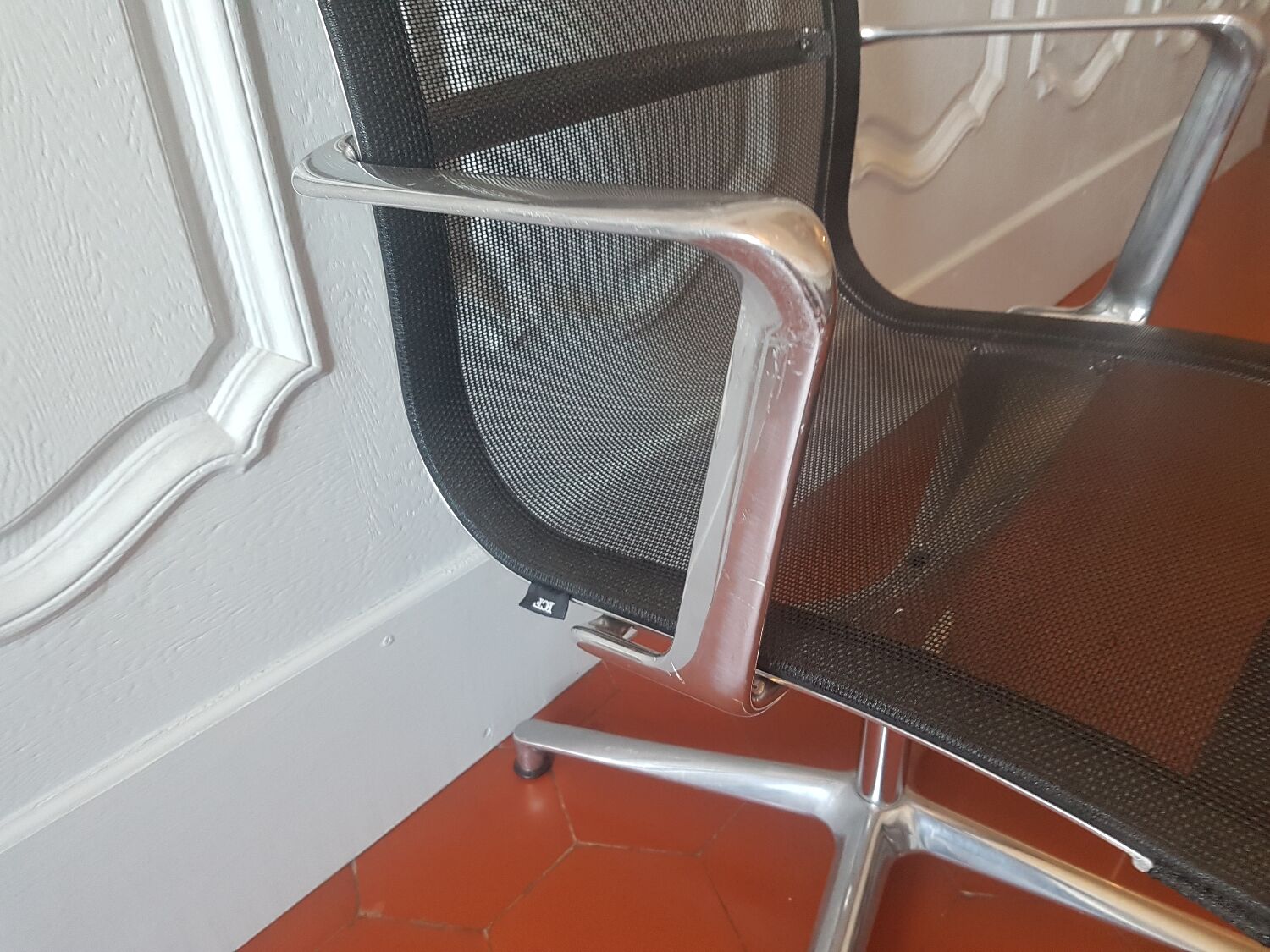 Una Chair armchair in black mesh published by ICF