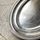 Oval silver-plated metal dish with palmette motif