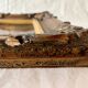 Pair of old carved wooden and plaster frames