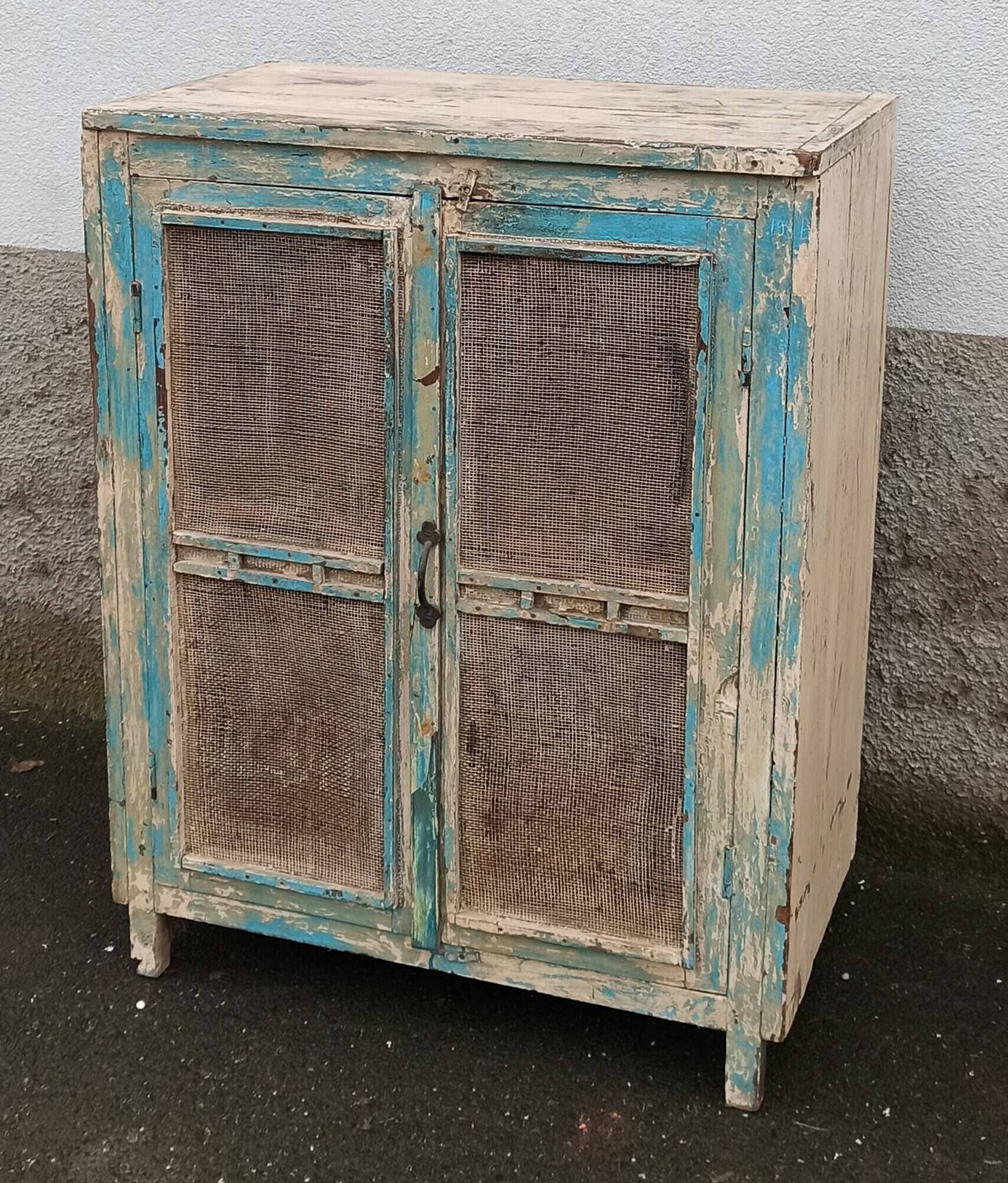 Small pantry buffet in old wood with mesh doors