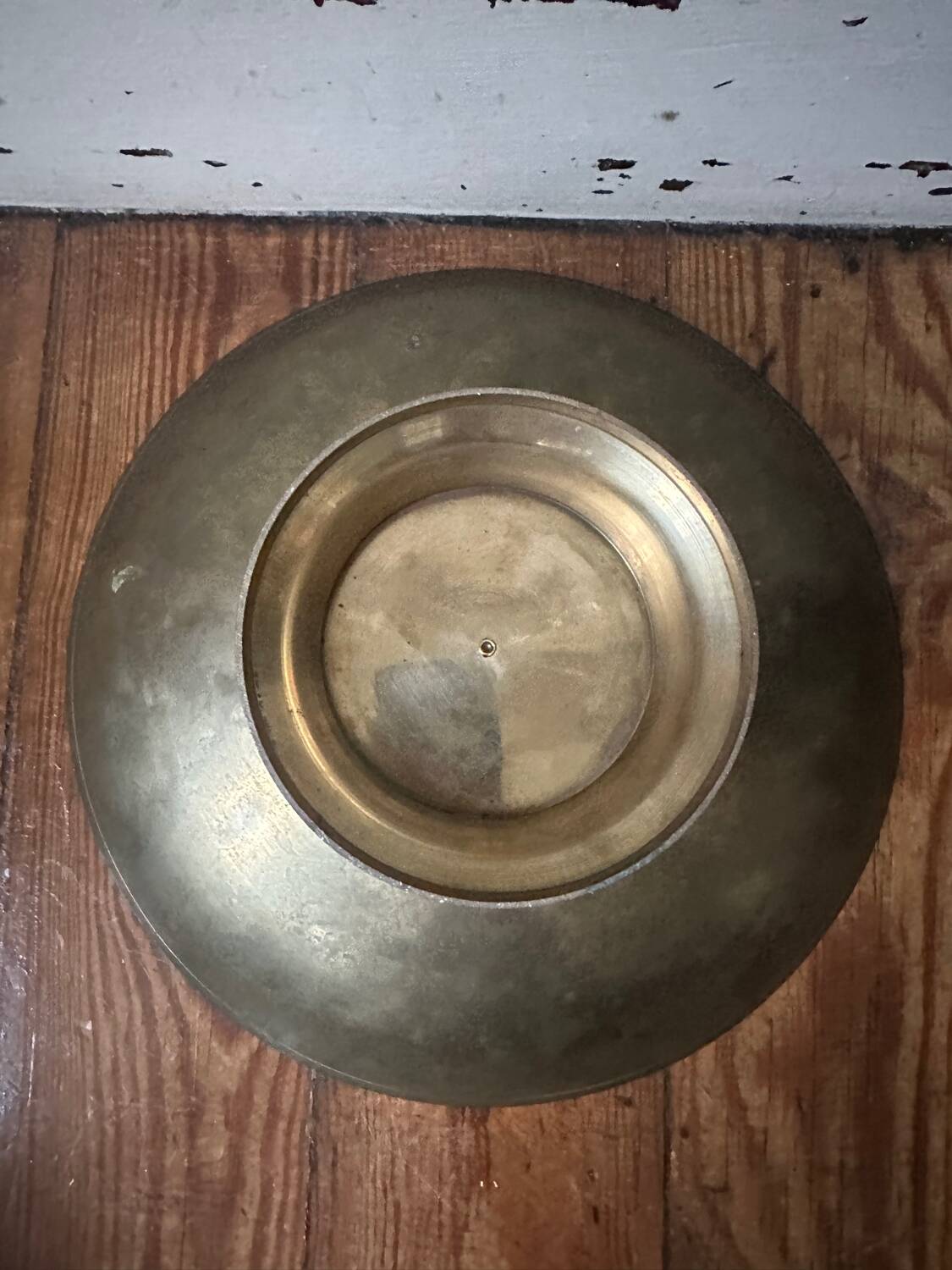 Enameled brass pocket emptier