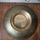 Enameled brass pocket emptier
