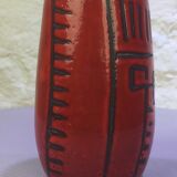 Red ceramic vase with free patterns
