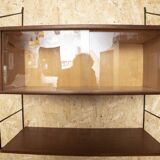 Nils Strinning mature display case