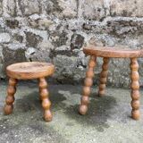 Set of two tripod Breton stools