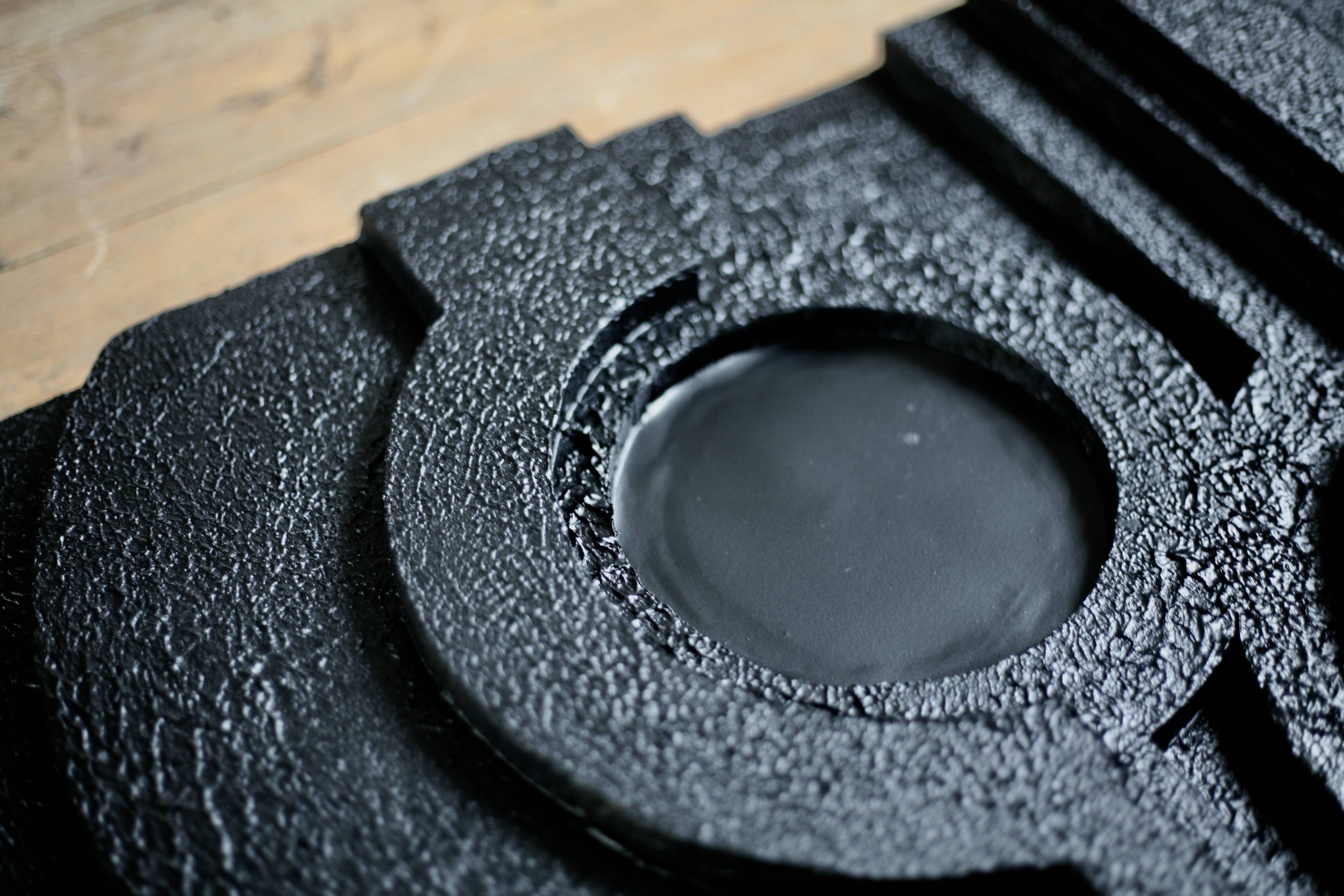 Wall sculpture, wood and black coating, late 1970s