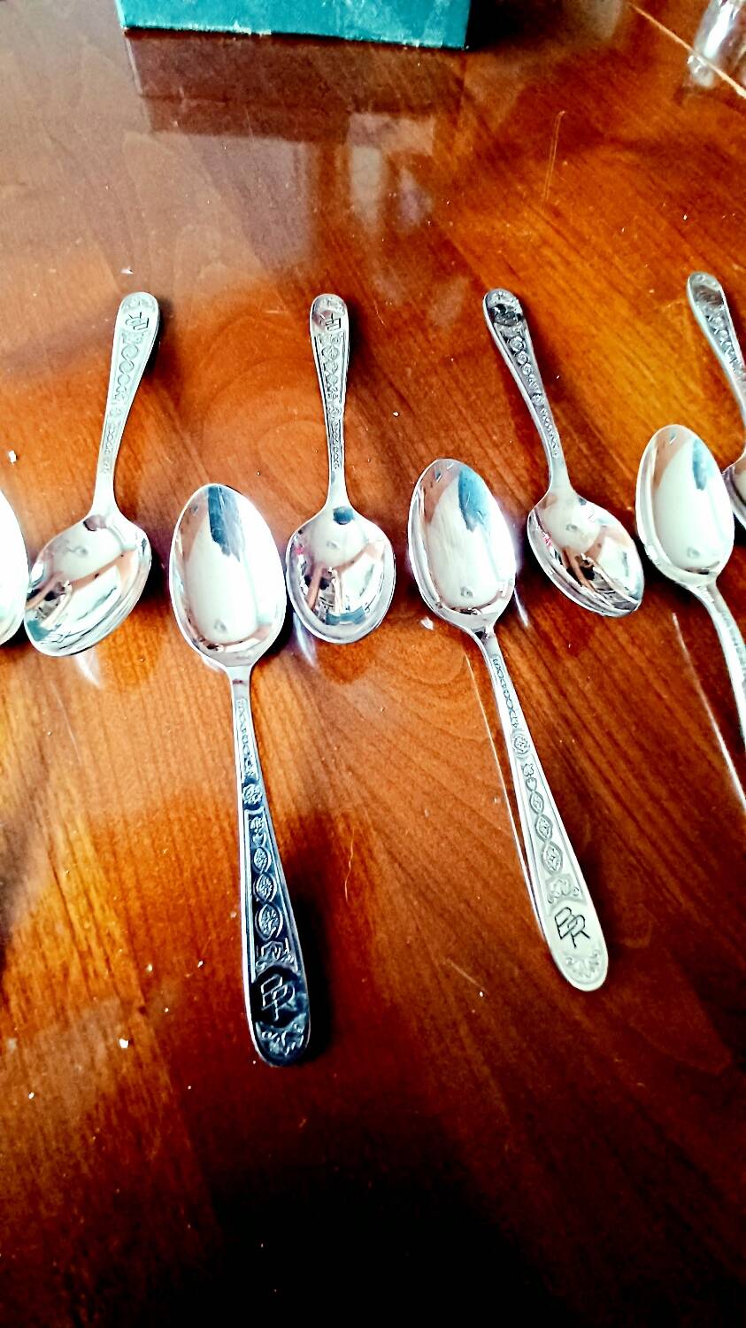 Set of 12 small Christofle Art Deco spoons