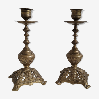 Duo worked brass candle holders