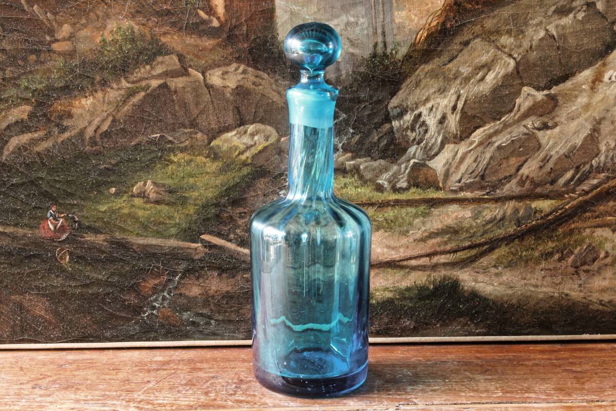Large blown crystal bottle, twisted, turquoise blue, early 20th century.