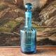 Large blown crystal bottle, twisted, turquoise blue, early 20th century.