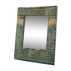 Petit miroir en bois sculpté à