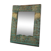 Small carved wooden mirror with green and gold patina